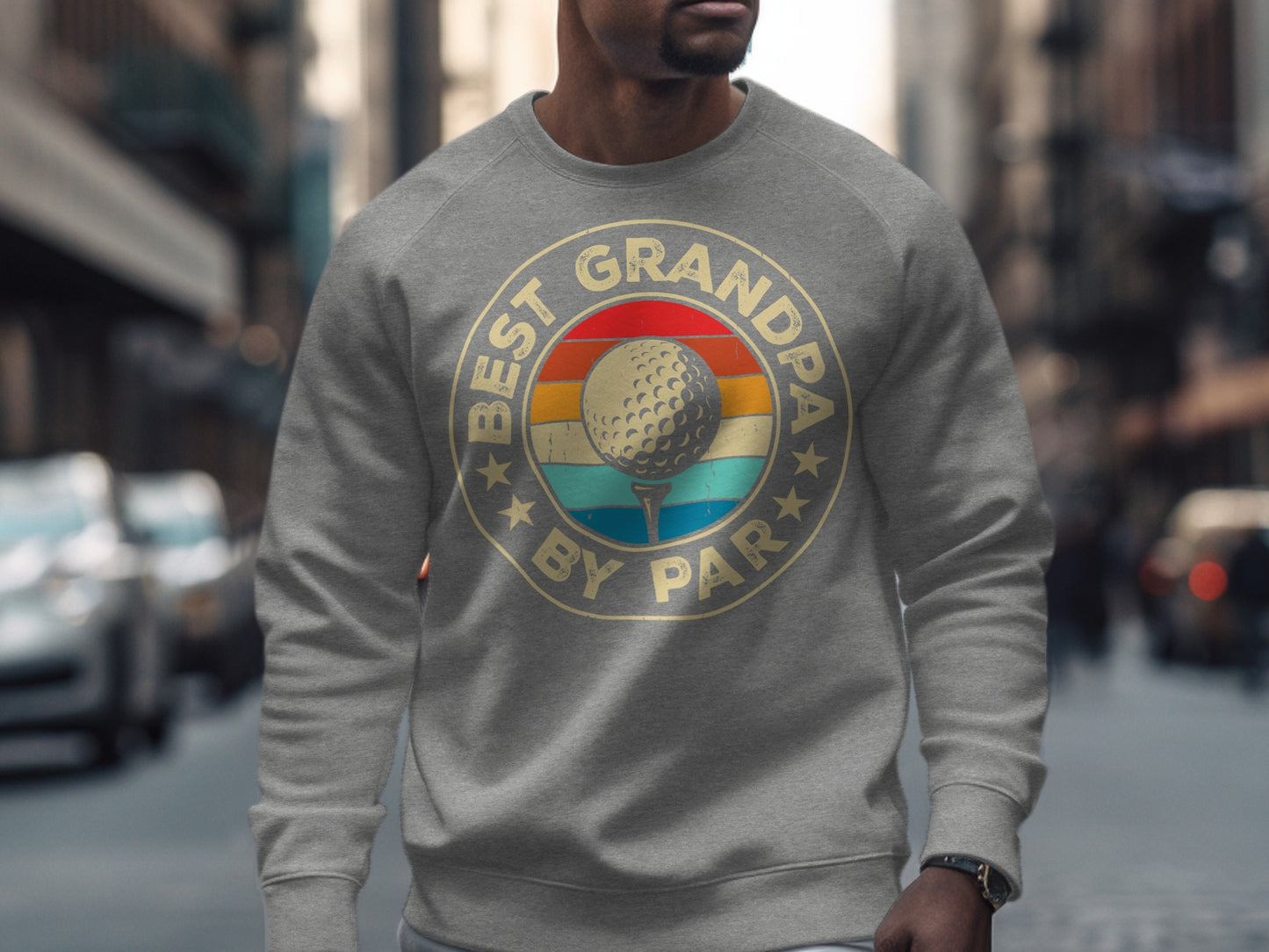 Gray sweatshirt with "Best Grandpa by Par" text and golf ball graphic.