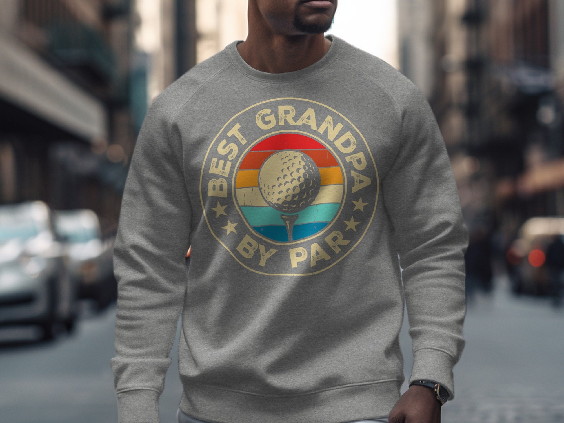 Gray sweatshirt with "Best Grandpa by Par" text and golf ball graphic.