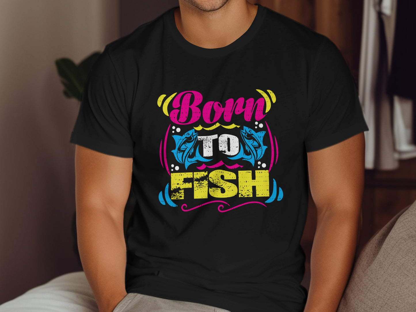 Black t-shirt with "Born to Fish" text and colorful fish design.
