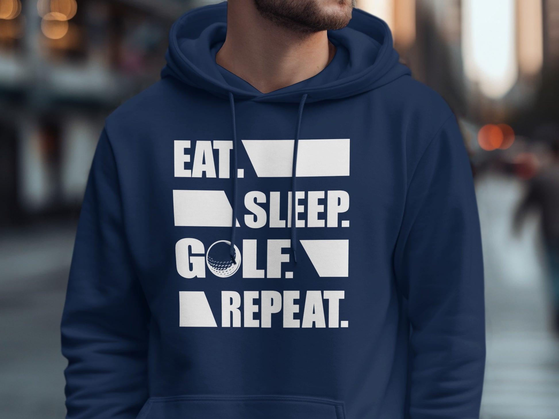 Navy hoodie with "Eat. Sleep. Golf. Repeat." text and golf ball.