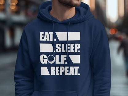 Navy hoodie with "Eat. Sleep. Golf. Repeat." text and golf ball.