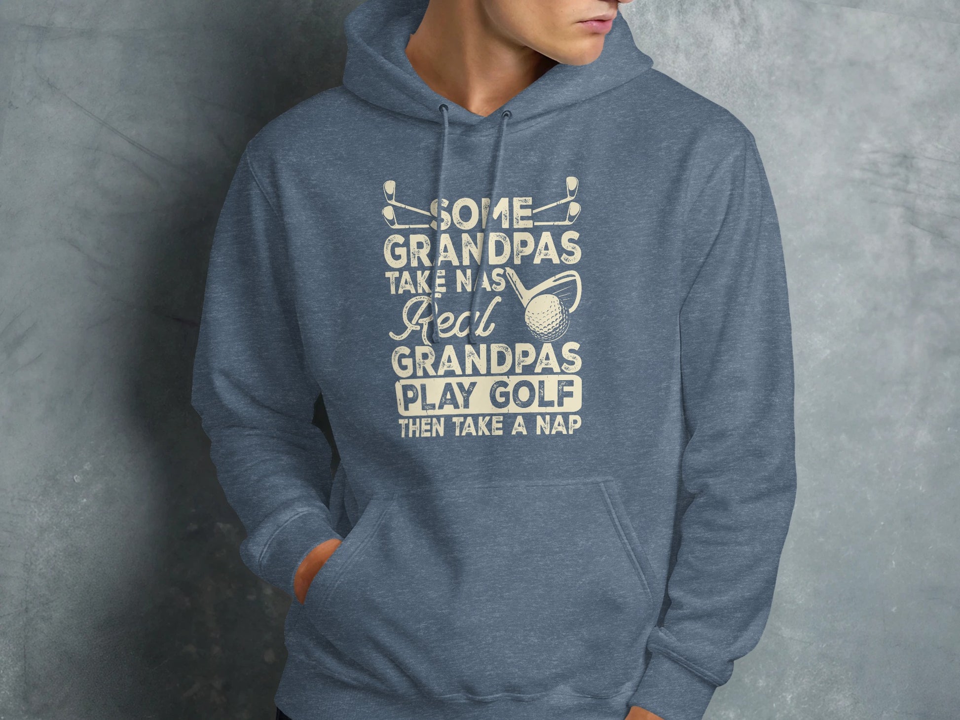 Hoodie with "Some Grandpas Play Golf Then Take a Nap" text and golf graphics.