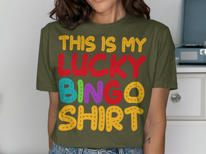 Green t-shirt with "THIS IS MY LUCKY BINGO SHIRT" in colorful stitched lettering.