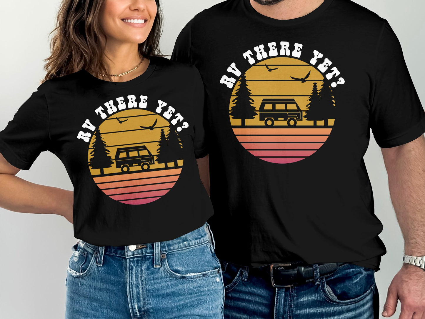 Black t-shirts with "RV THERE YET?" text and sunset graphic.