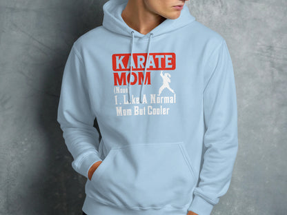 Light blue hoodie with "Karate Mom But Cooler" text and silhouette.