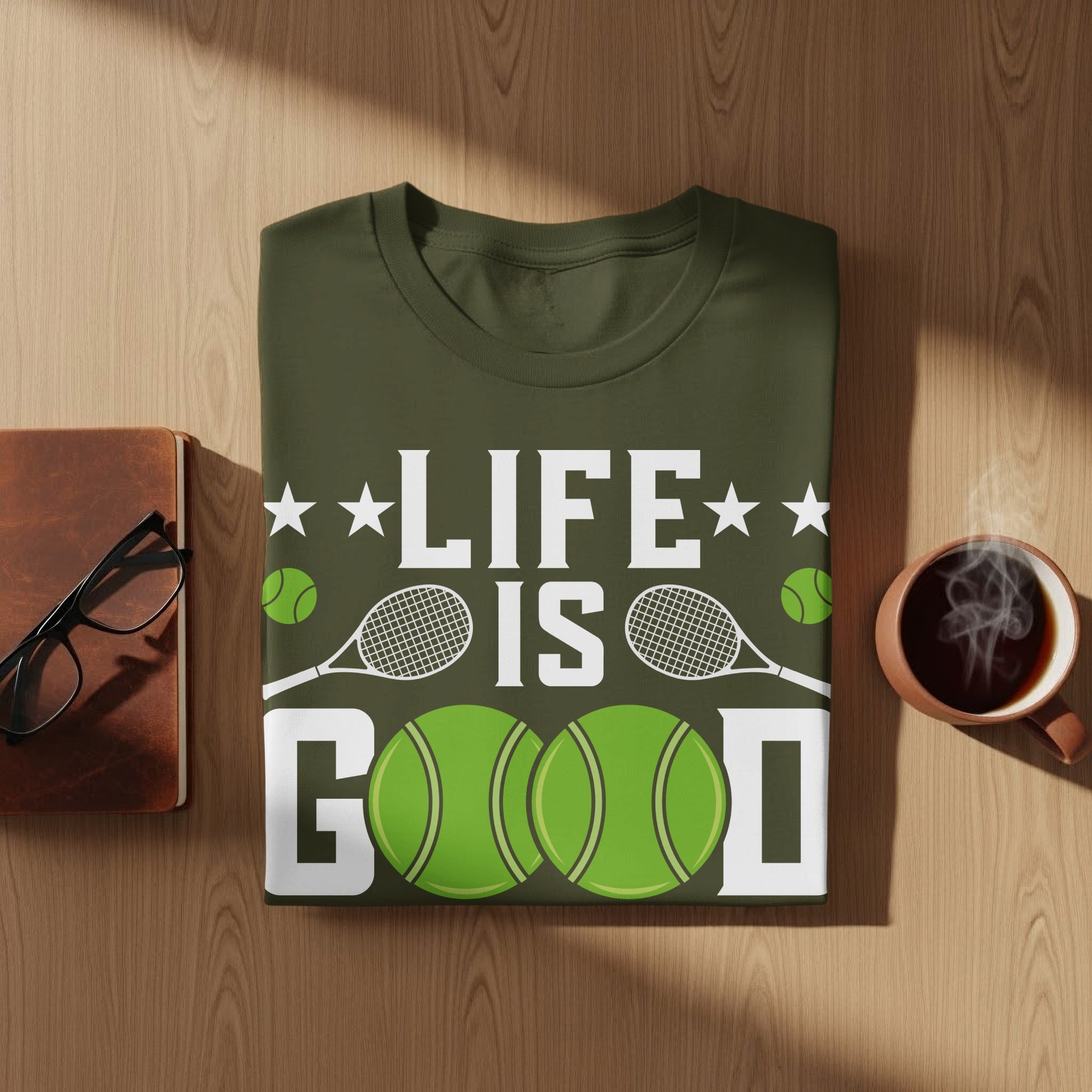 Olive green t-shirt with "LIFE IS GOOD" text and tennis balls.