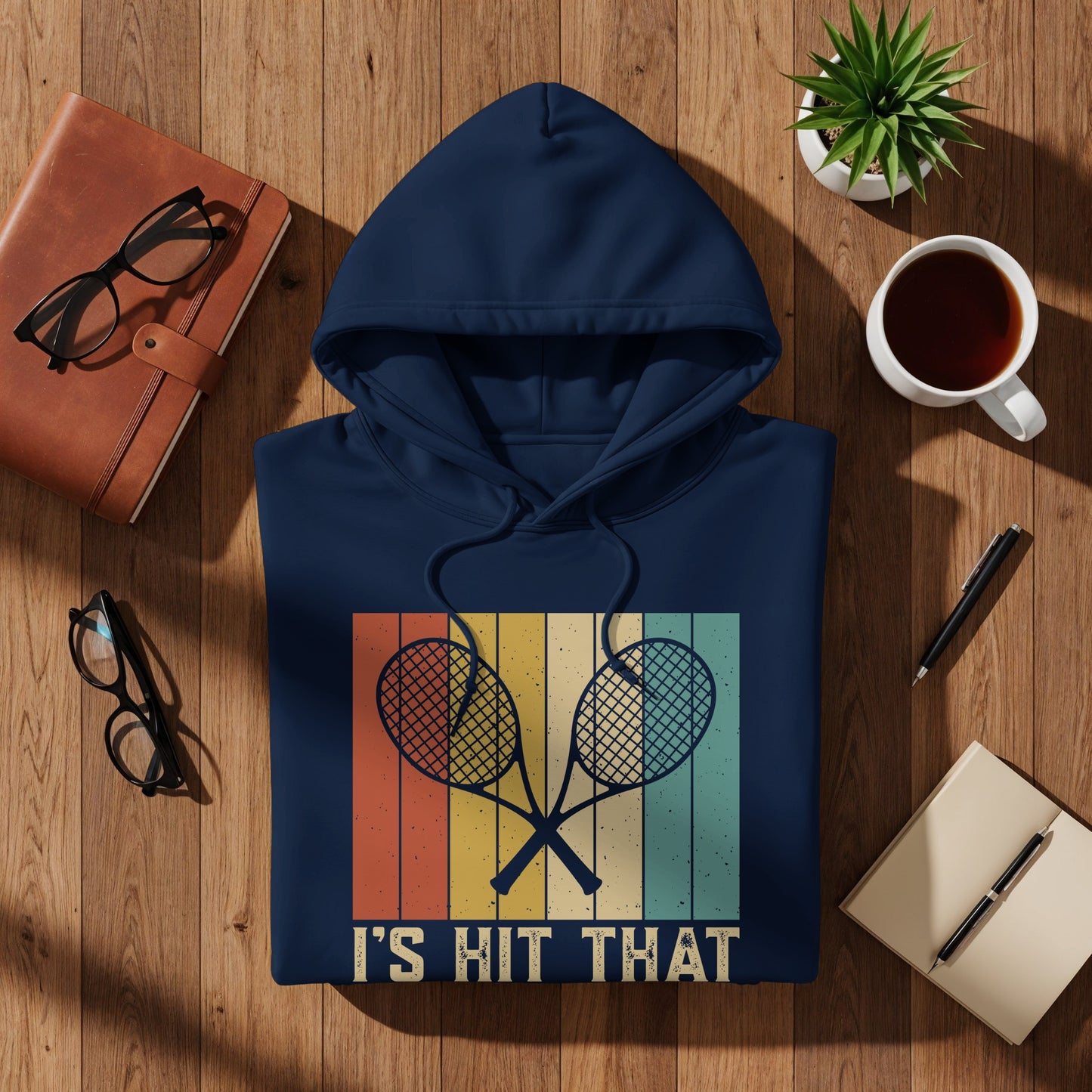 Navy hoodie with vintage tennis rackets and "I'S HIT THAT" text.