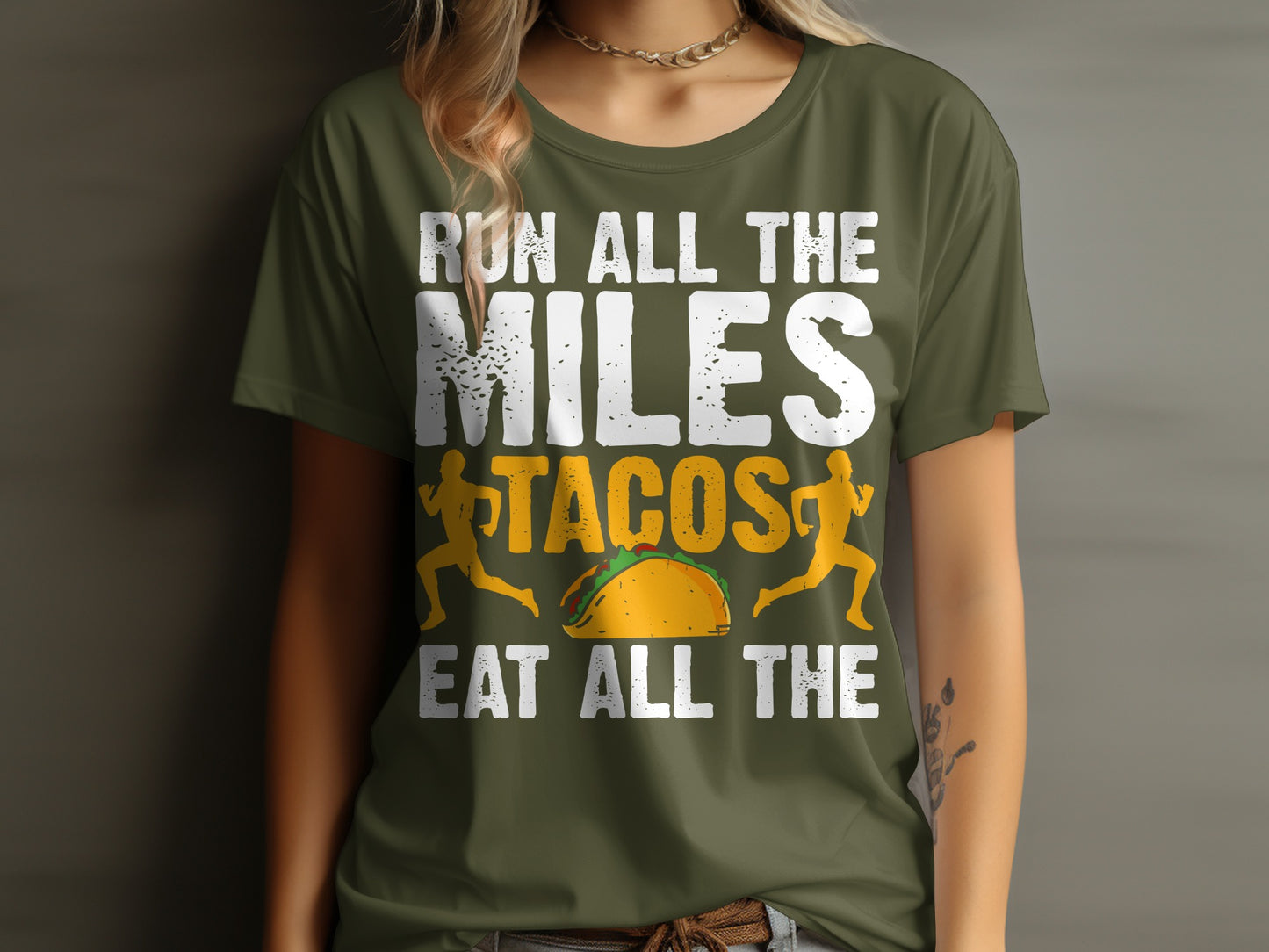 Green t-shirt with "Run all the miles, eat all the tacos" and running figures.