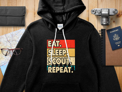 Black Gildan hoodie with "Eat. Sleep. Scout. Repeat." text.