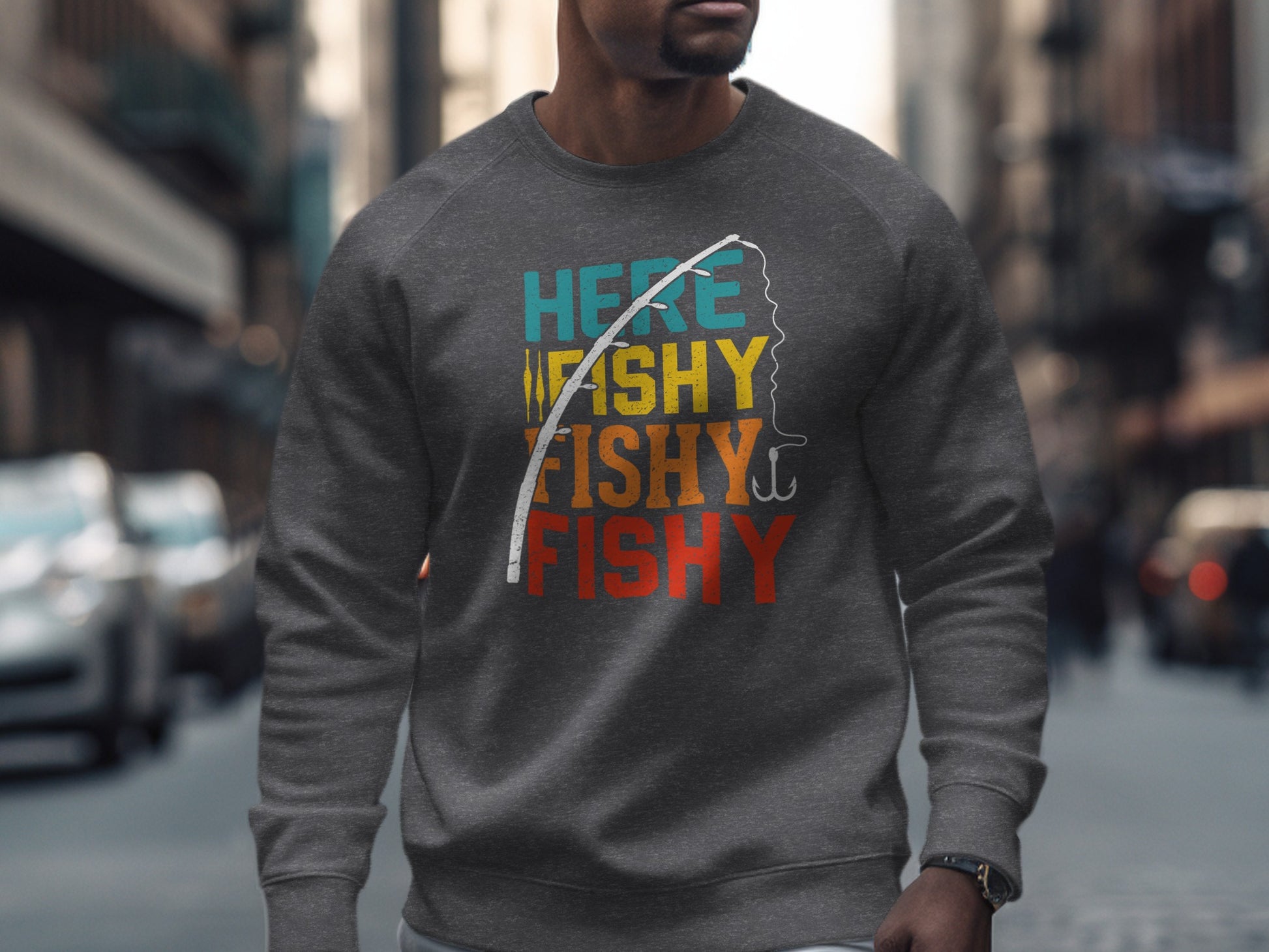 Grey sweatshirt with "Fishy Fishy Fishy" text and a fishing rod graphic.