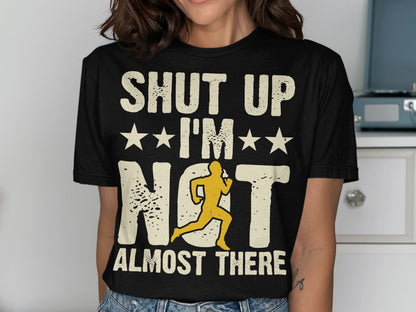 Black t-shirt with "Shut Up I'm Not Almost There" and a running silhouette.