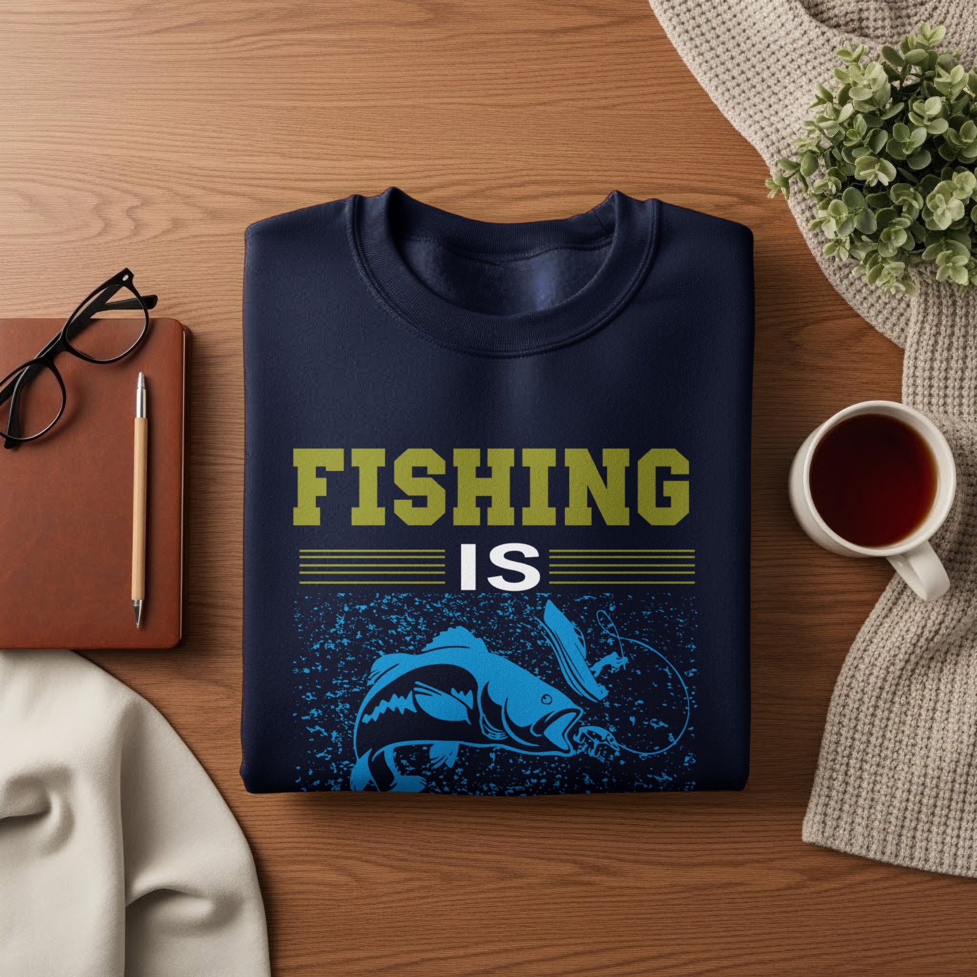 Navy sweatshirt with "FISHING IS" and a blue fish and lure graphic.