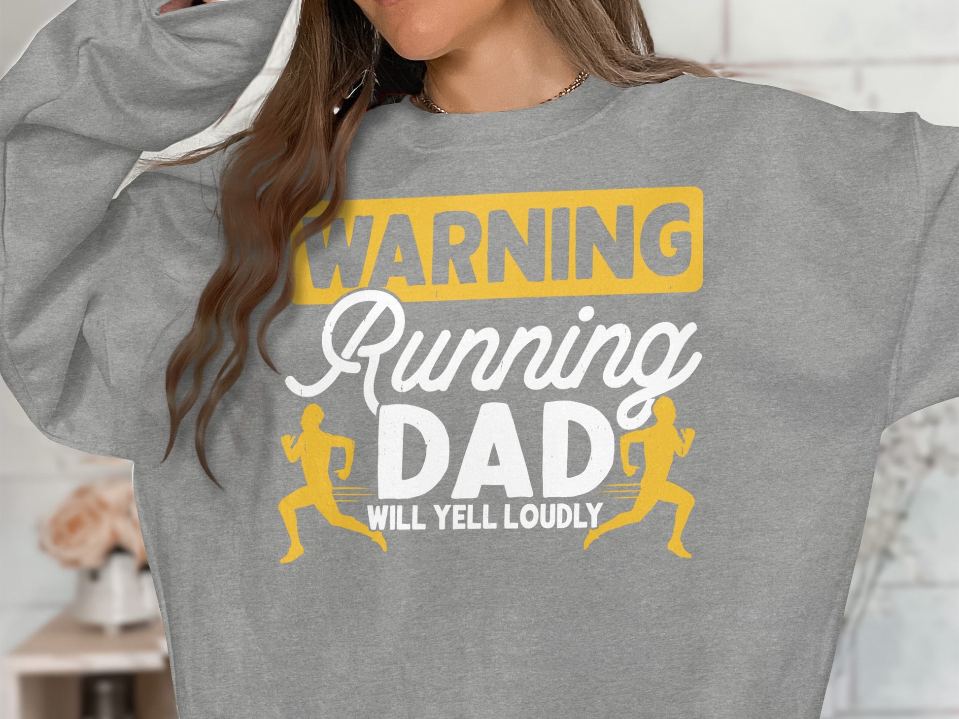 Gray sweatshirt with "WARNING Running DAD WILL YELL LOUDLY" text and runner graphics.