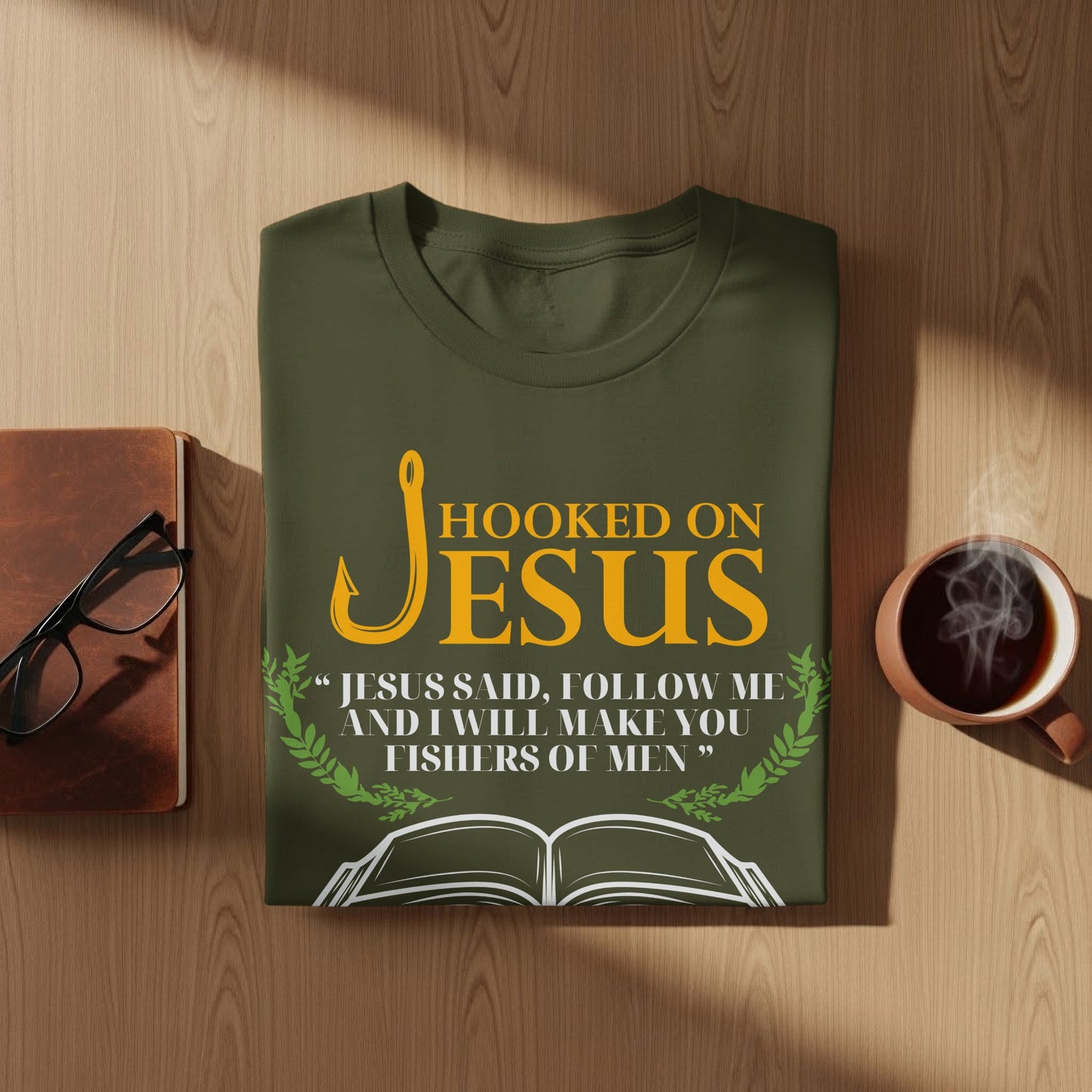 Olive green t-shirt with "Hooked on Jesus" and Bible verse.