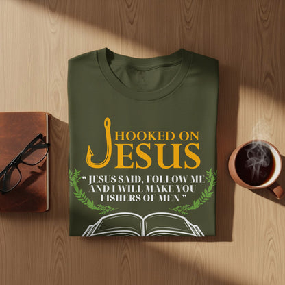 Olive green t-shirt with "Hooked on Jesus" and Bible verse.