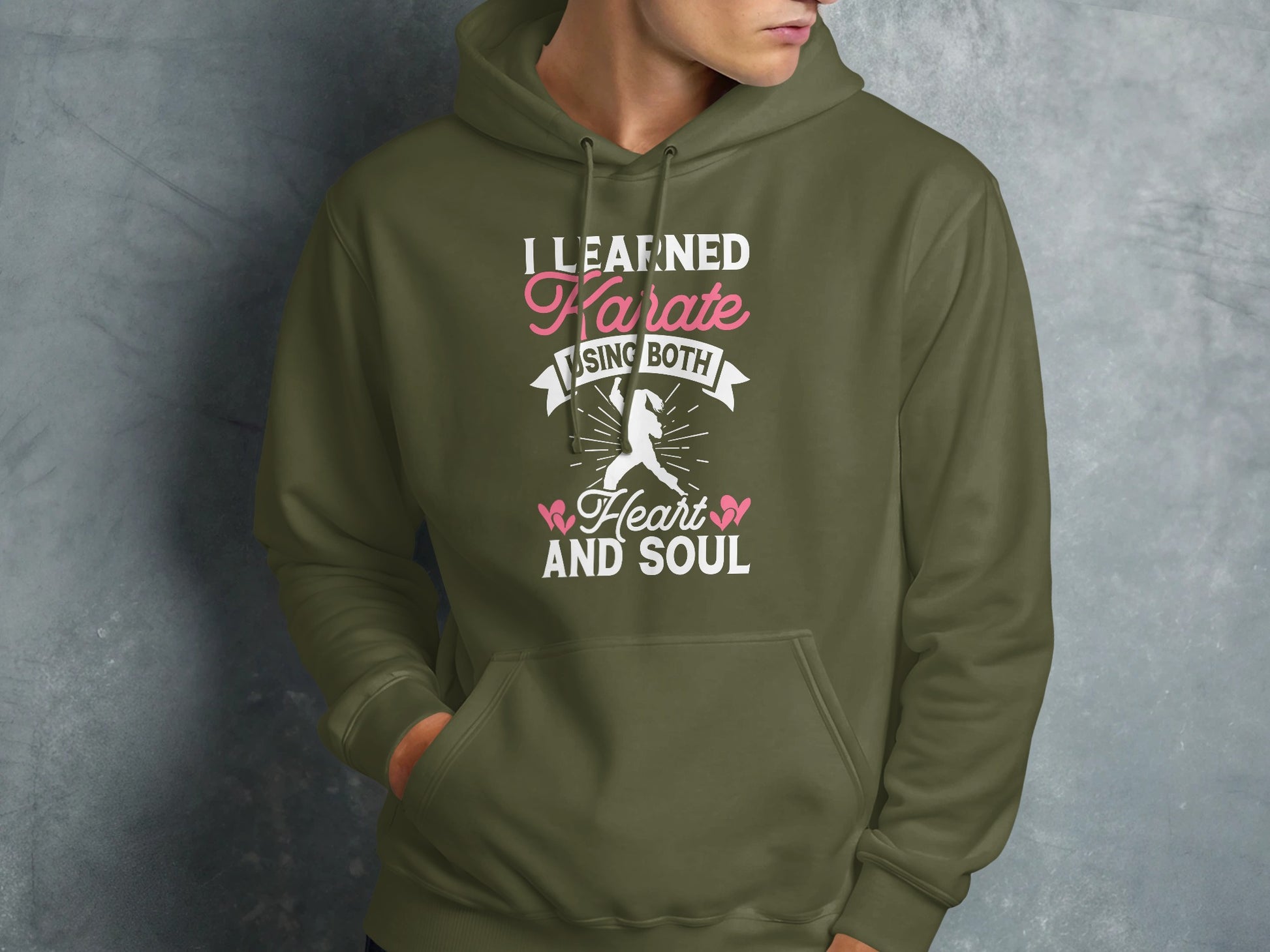 Olive green hoodie with "I Learned Karate Using Both Heart and Soul" text.