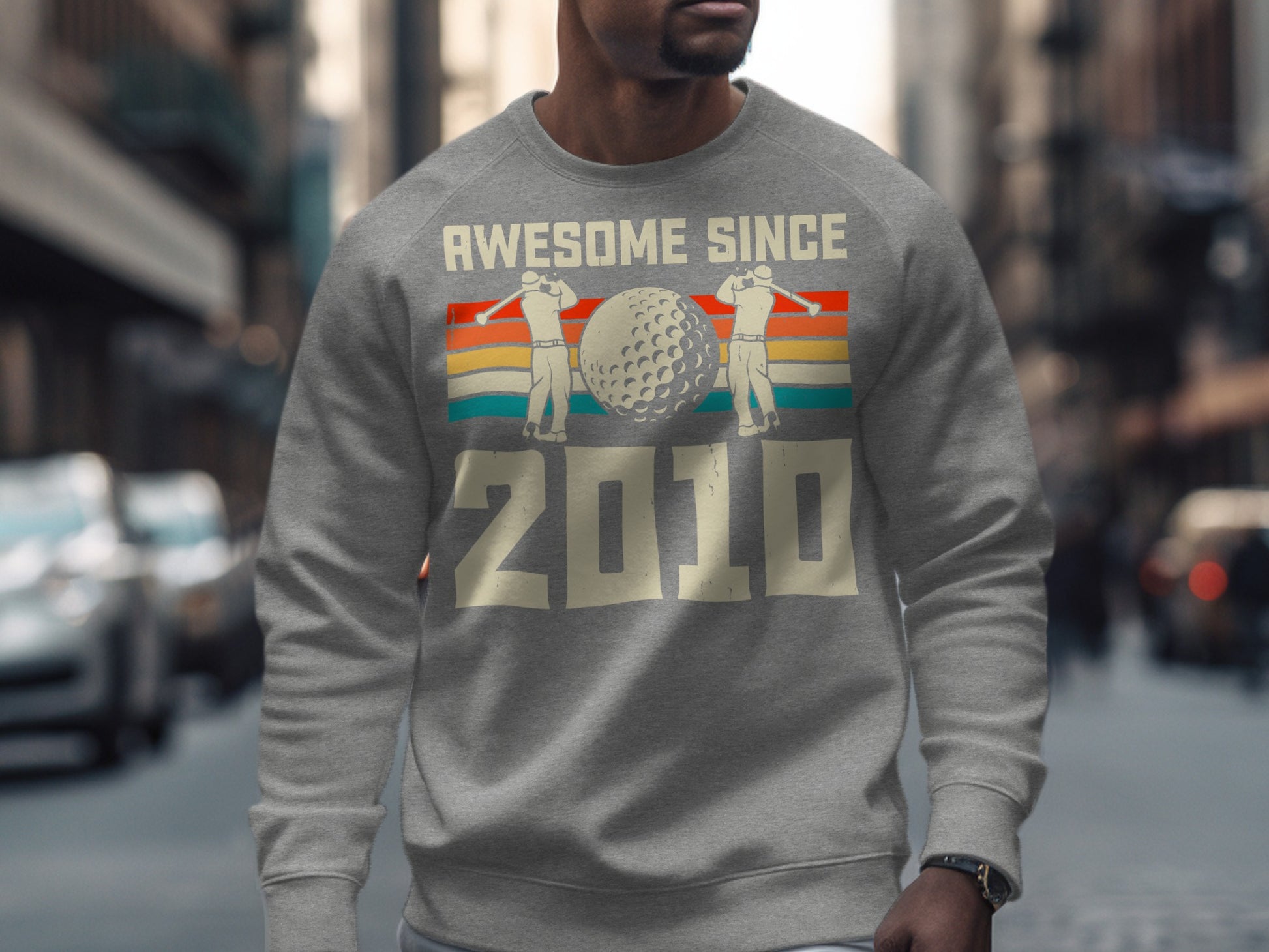 Gray sweatshirt with "Awesome Since 2010" and golf imagery.