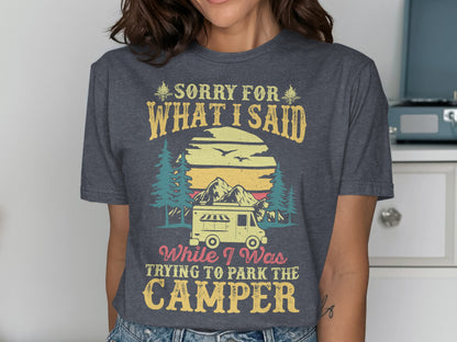 T-shirt with "Sorry for what I said while trying to park the camper" text and camper graphic.