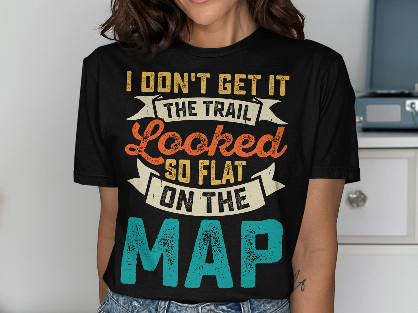 Black t-shirt with "I don't get it the trail looked so flat on the map" text.
