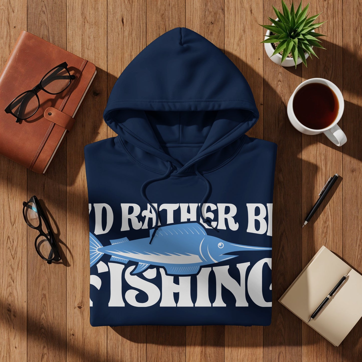 Navy hoodie with "I'd rather be fishing" text and marlin graphic.