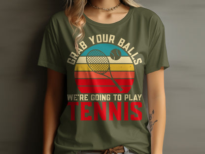 Olive t-shirt with vintage tennis graphic and text "GRAB YOUR BALLS WE'RE GOING TO TENNIS".