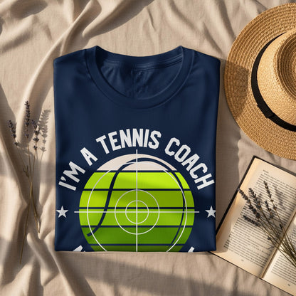 Navy t-shirt with "I'm a tennis coach" text and tennis ball graphic.