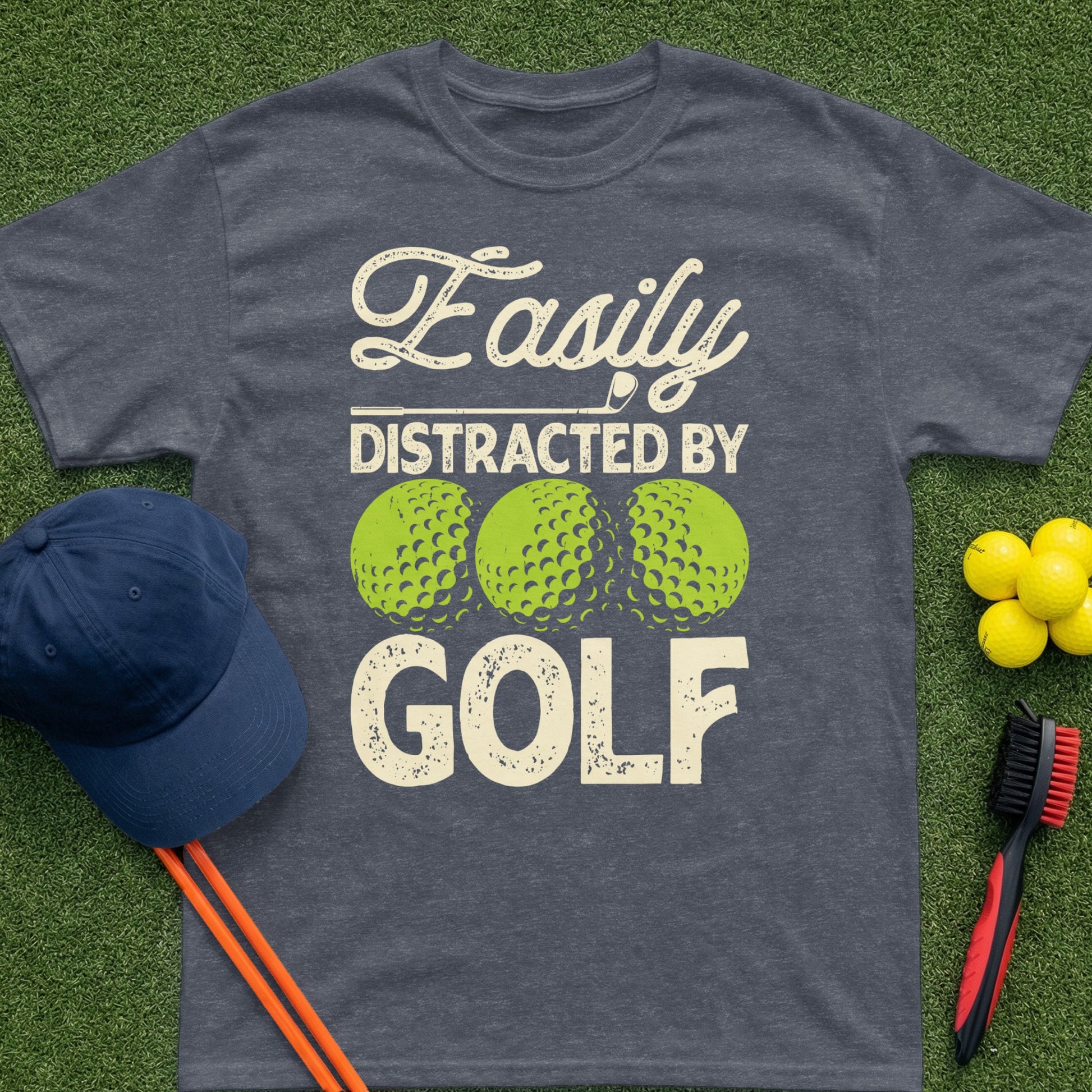 T-shirt with "Easily Distracted By Golf" text and golf ball graphics.