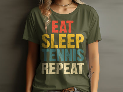 Olive green t-shirt with "Eat Sleep Tennis Repeat" text in distressed colors.