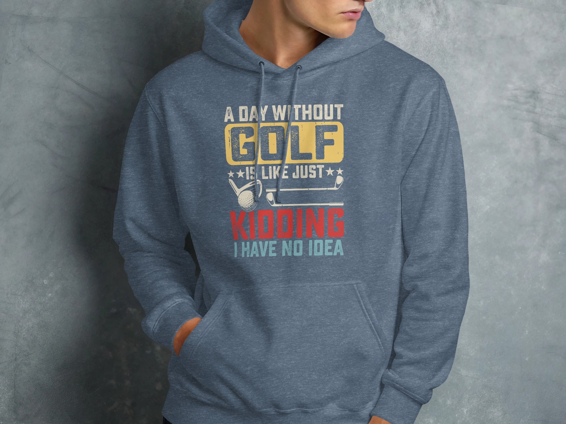 Blue hooded sweatshirt with "A day without golf is like just kidding I have no idea" text.