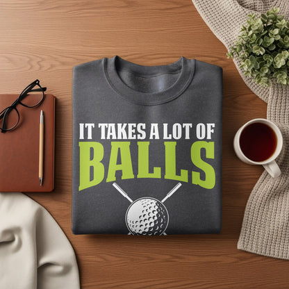 Dark gray sweatshirt with "IT TAKES A LOT OF BALLS" and golf club graphic.