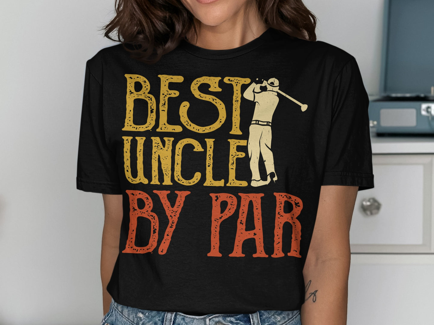 Black t-shirt with "BEST UNCLE BY PAR" text and golfer graphic.