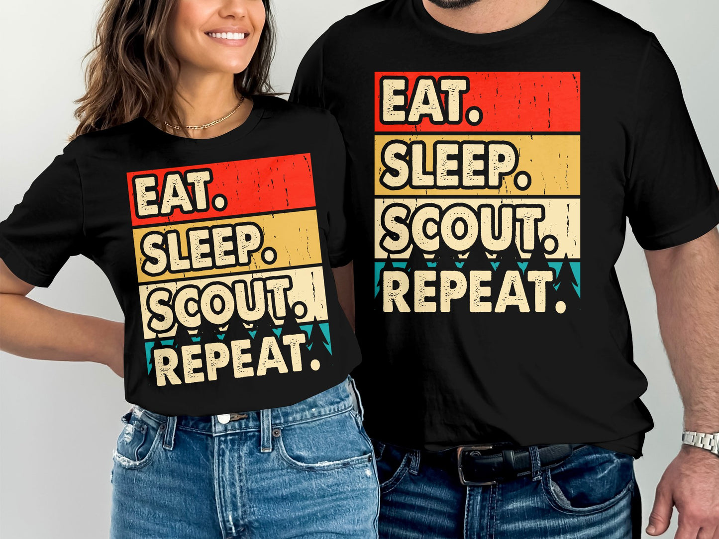Black t-shirts with "Eat. Sleep. Scout. Repeat." text in distressed red, yellow, and blue.