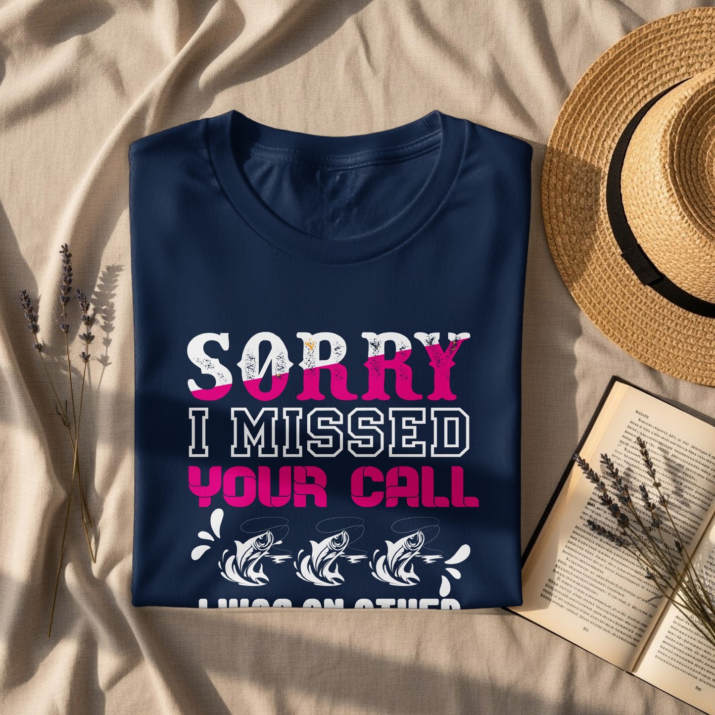 Dark blue t-shirt with "SORRY I MISSED YOUR CALL FISHING ON OTHER LINES" text.