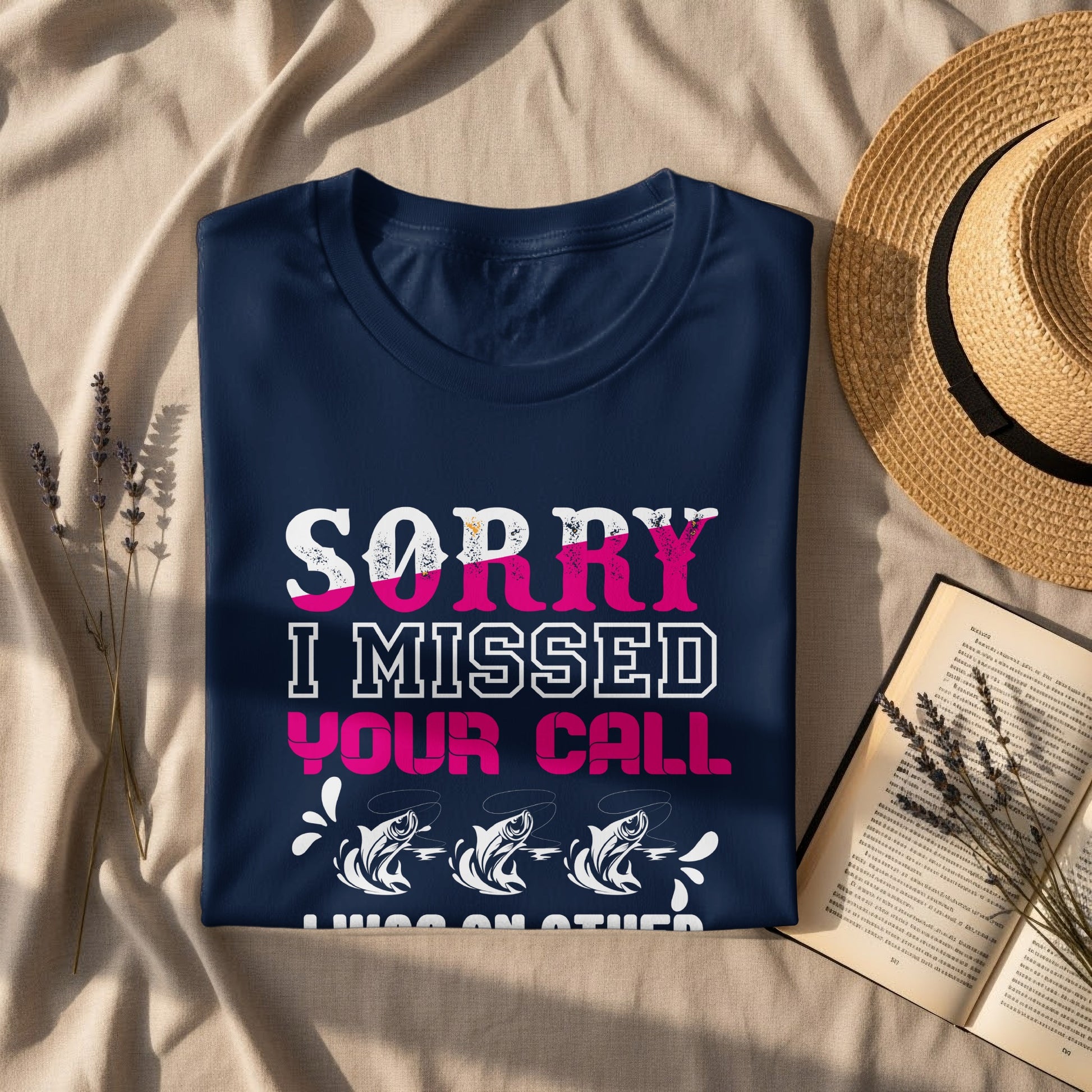 Dark blue t-shirt with "SORRY I MISSED YOUR CALL FISHING ON OTHER LINES" text.
