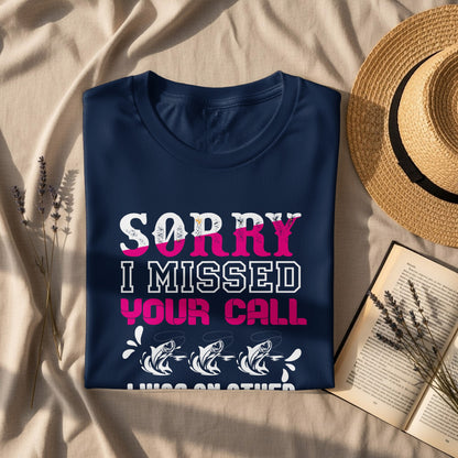 Dark blue t-shirt with "SORRY I MISSED YOUR CALL FISHING ON OTHER LINES" text.
