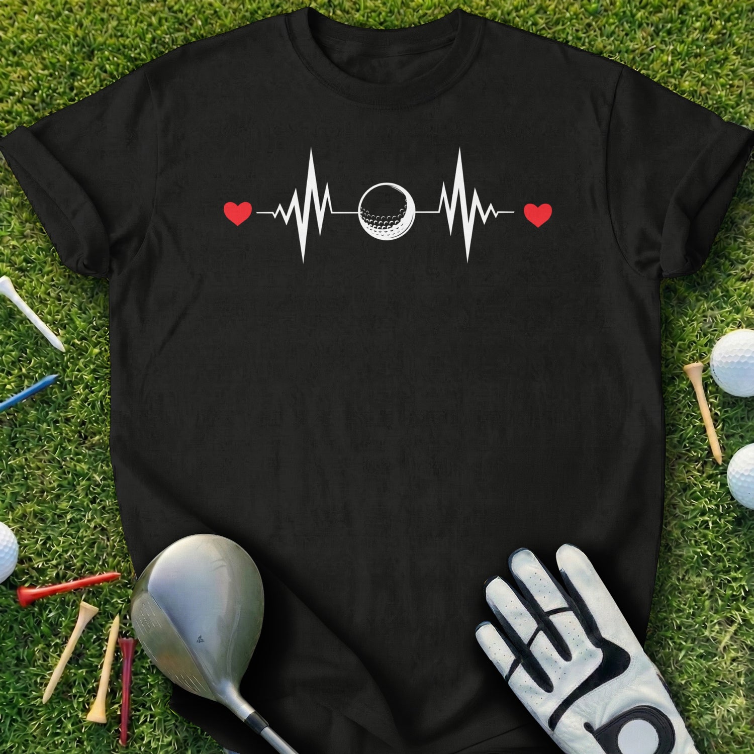 Black t-shirt with a heartbeat graphic featuring a golf ball at the peak.