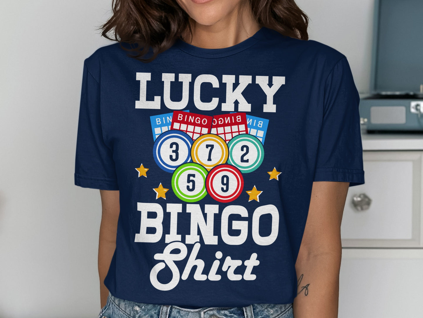 Navy blue t-shirt with "LUCKY BINGO Shirt" and bingo balls.