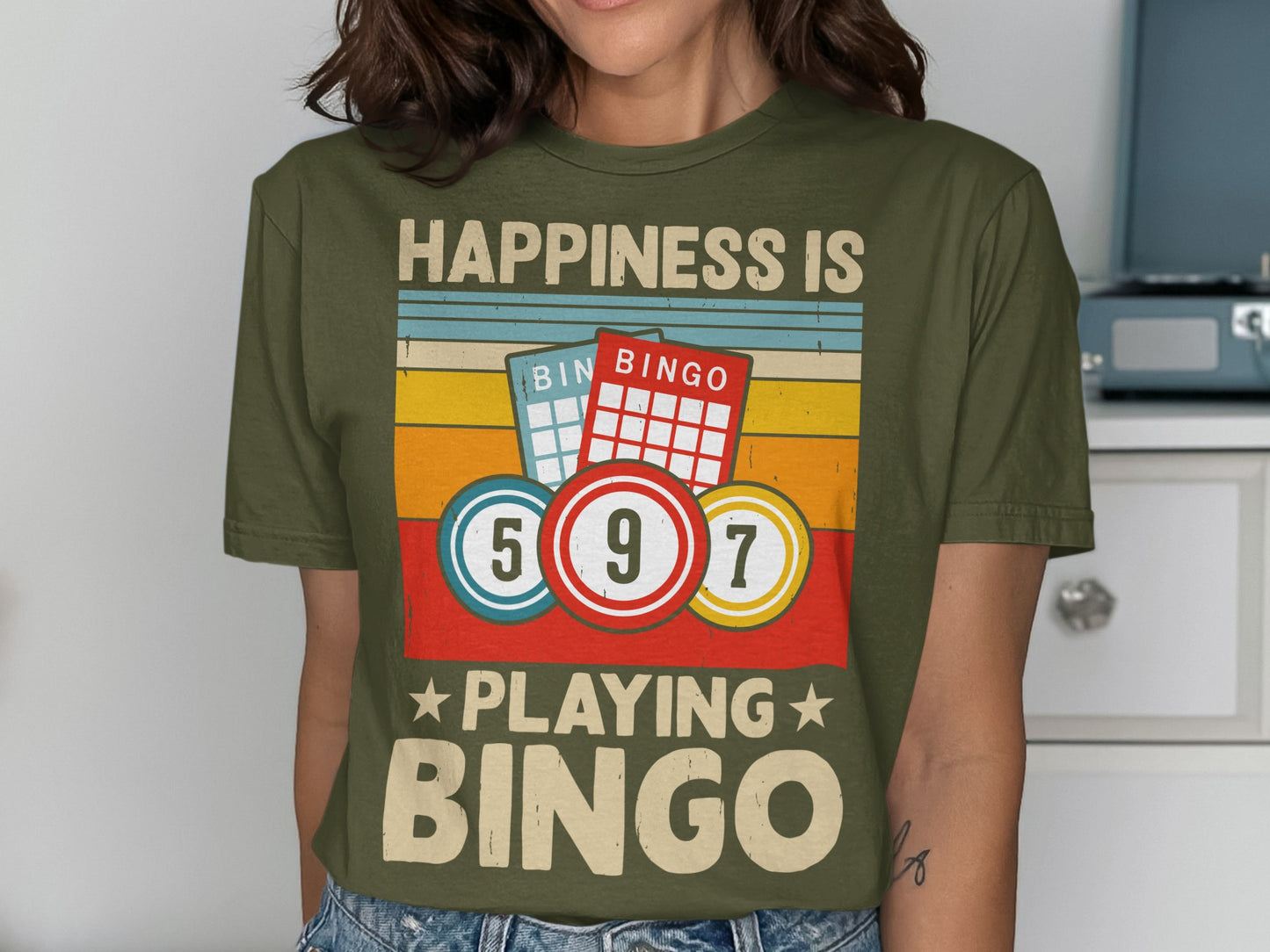 Green t-shirt with "Happiness is Playing Bingo" and bingo cards and balls.