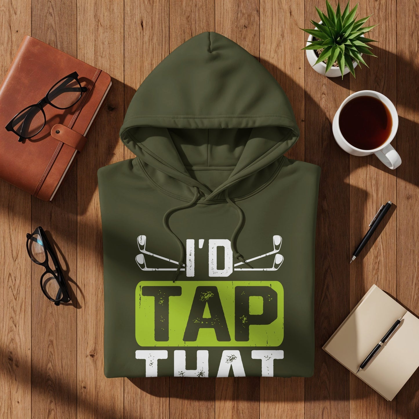 Green hoodie with "I'd TAP THAT" text and golf clubs.