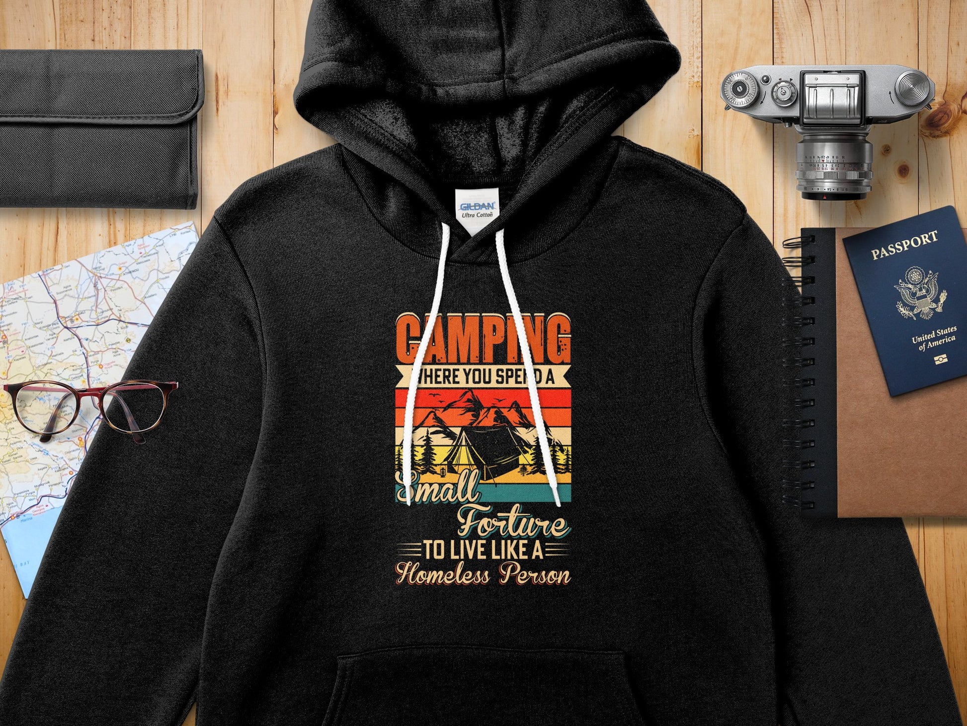 Gildan hoodie with "Camping: Where You Spend a Small Fortune to Live Like a Homeless Person" text.