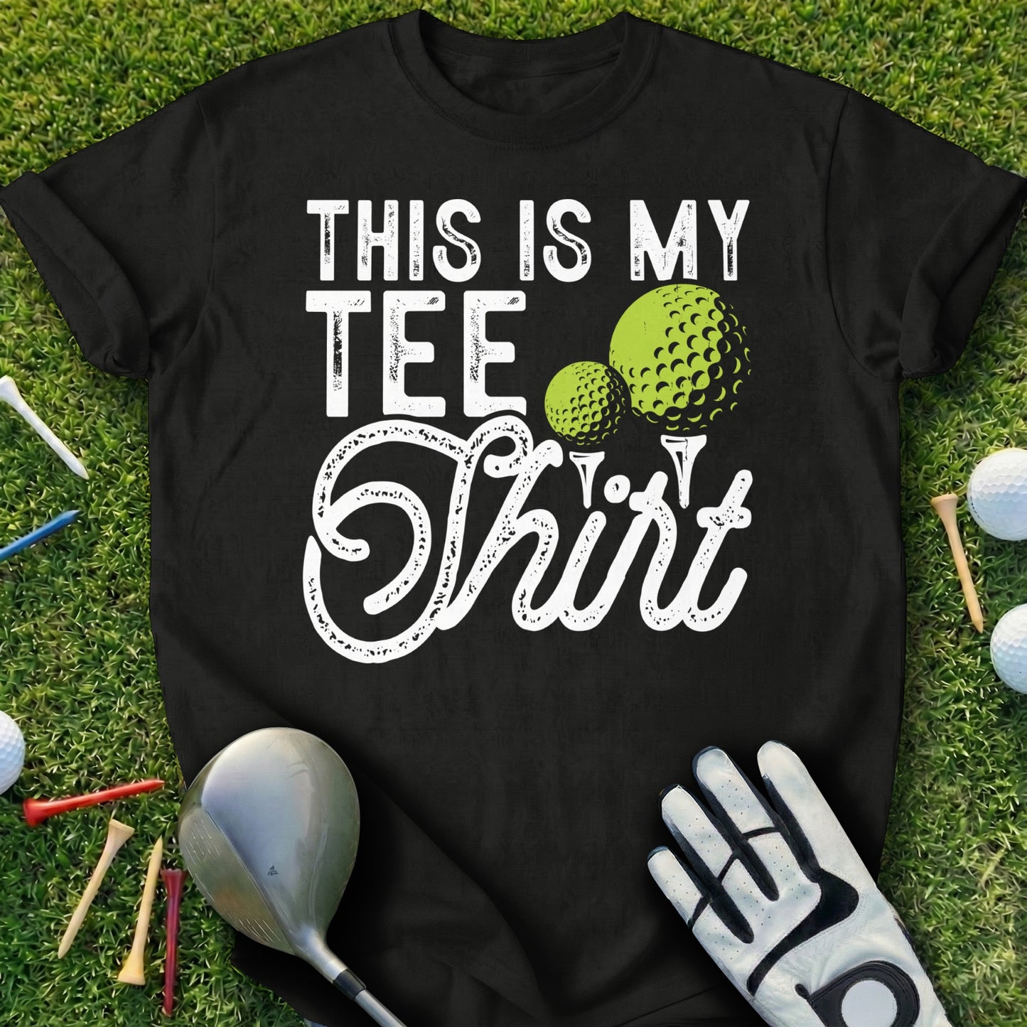 Black t-shirt with "THIS IS MY TEE Shirt" and golf balls.