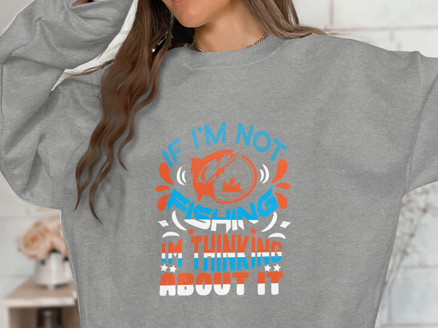 Gray sweatshirt with "If I'm not fishing, I'm thinking about it" text.