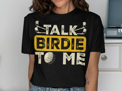 Black t-shirt with "TALK BIRDIE TO ME" and golf ball graphic.