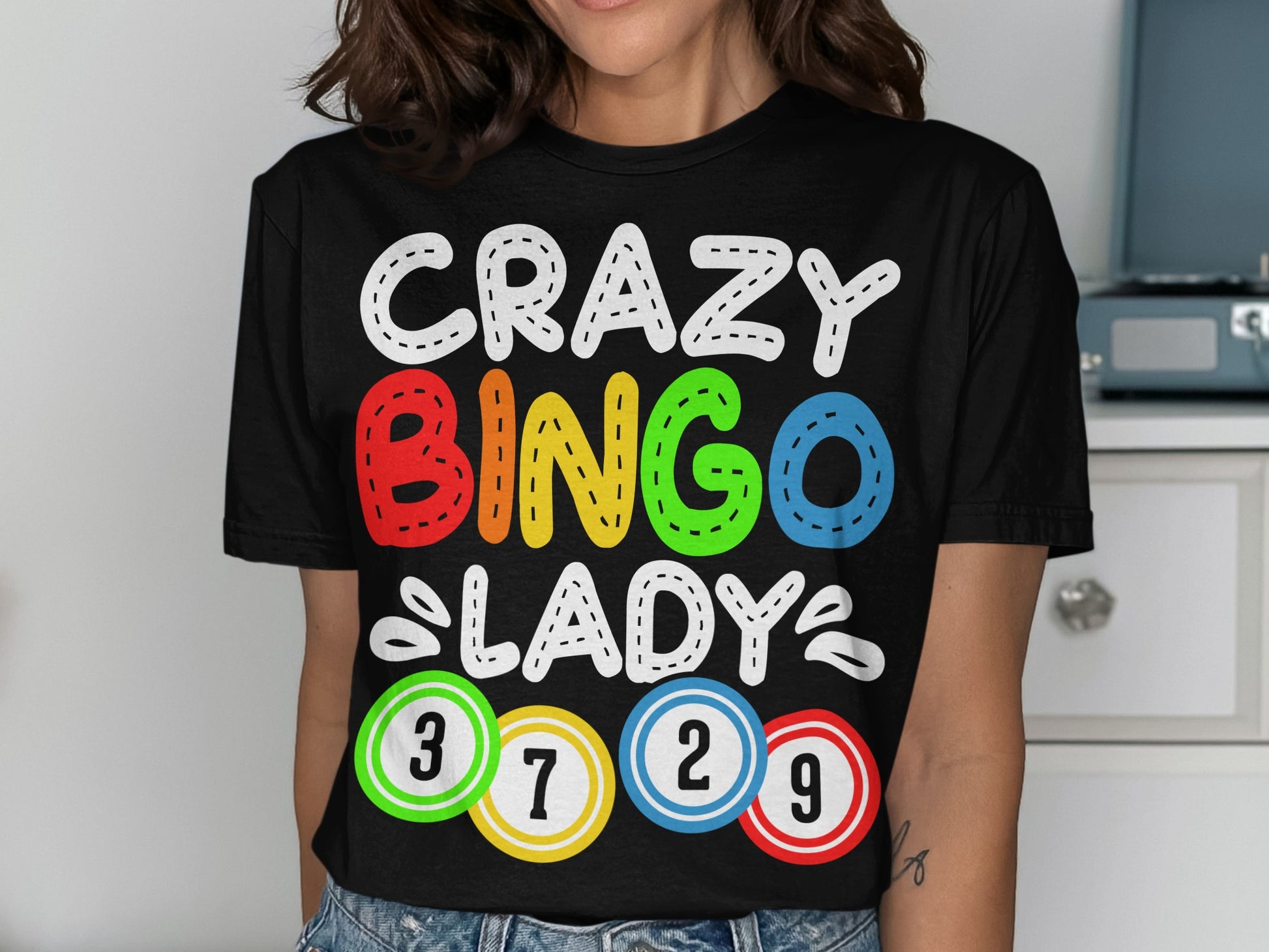 Black t-shirt with "CRAZY BINGO LADY" and bingo balls.