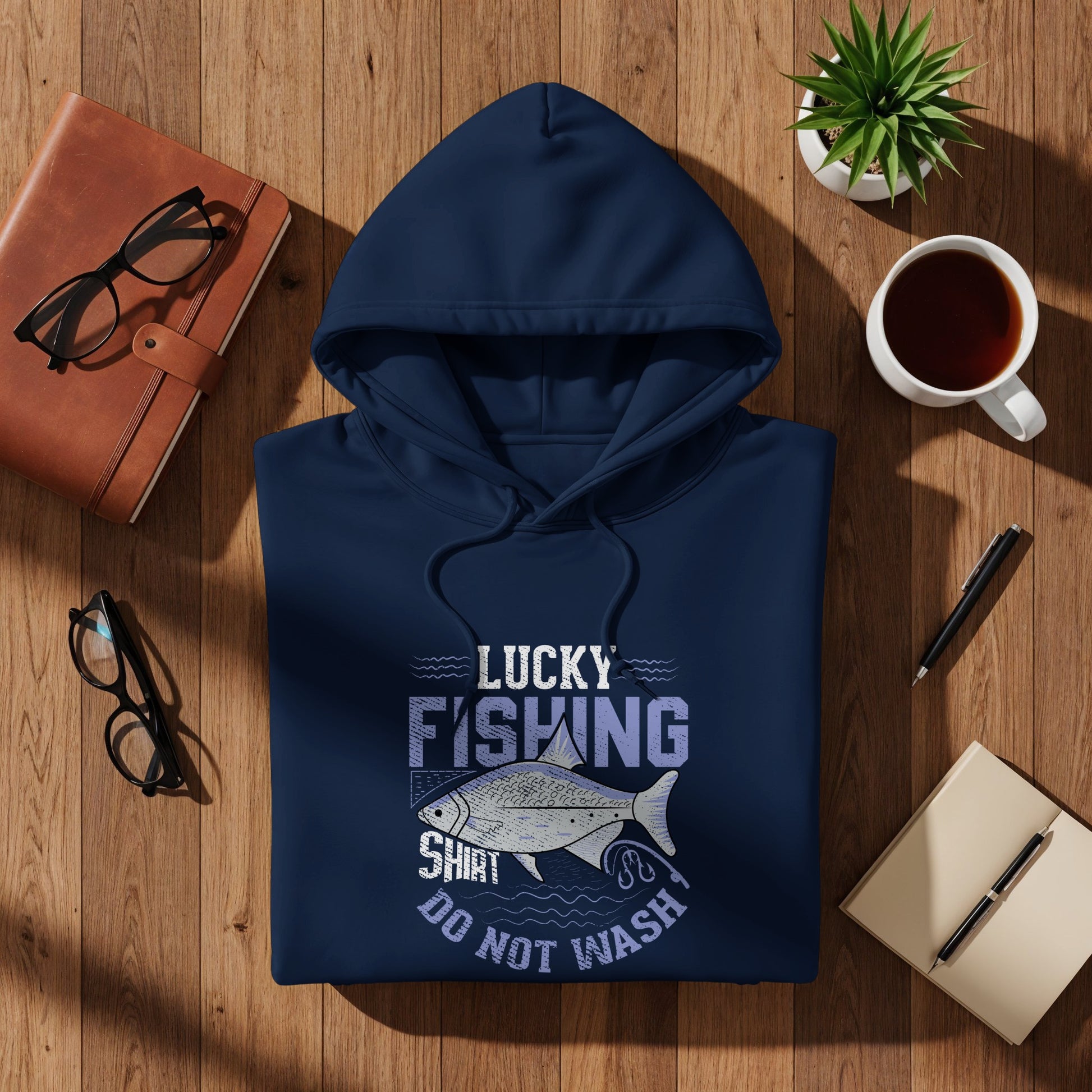 Navy blue hoodie with "Lucky Fishing Shirt Do Not Wash" text and fish graphic.