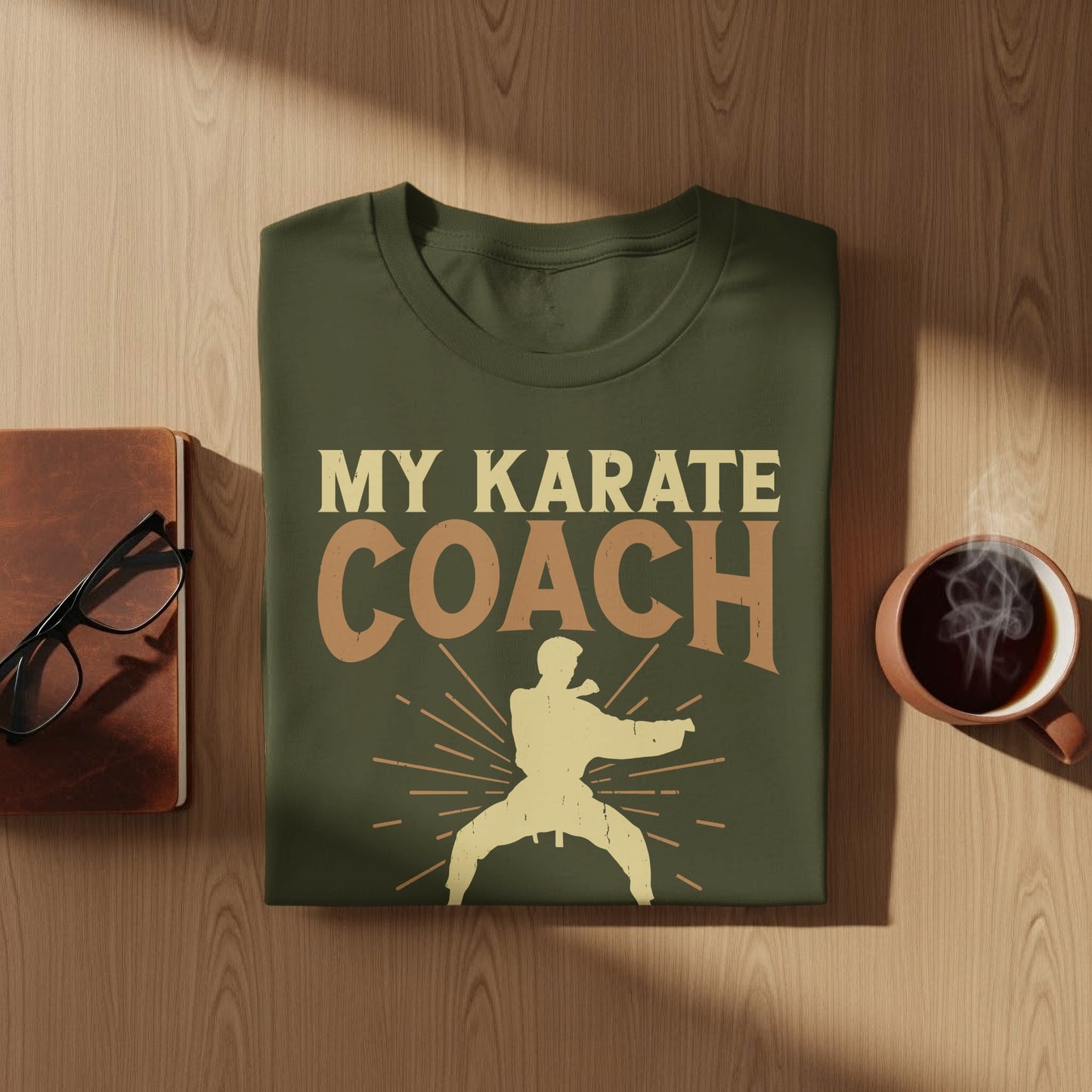 Green t-shirt with "My Karate Coach" text and a karate fighter graphic.