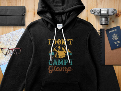Black Gildan hoodie with "I Don't Camp, I Glamp" text and tent graphic.