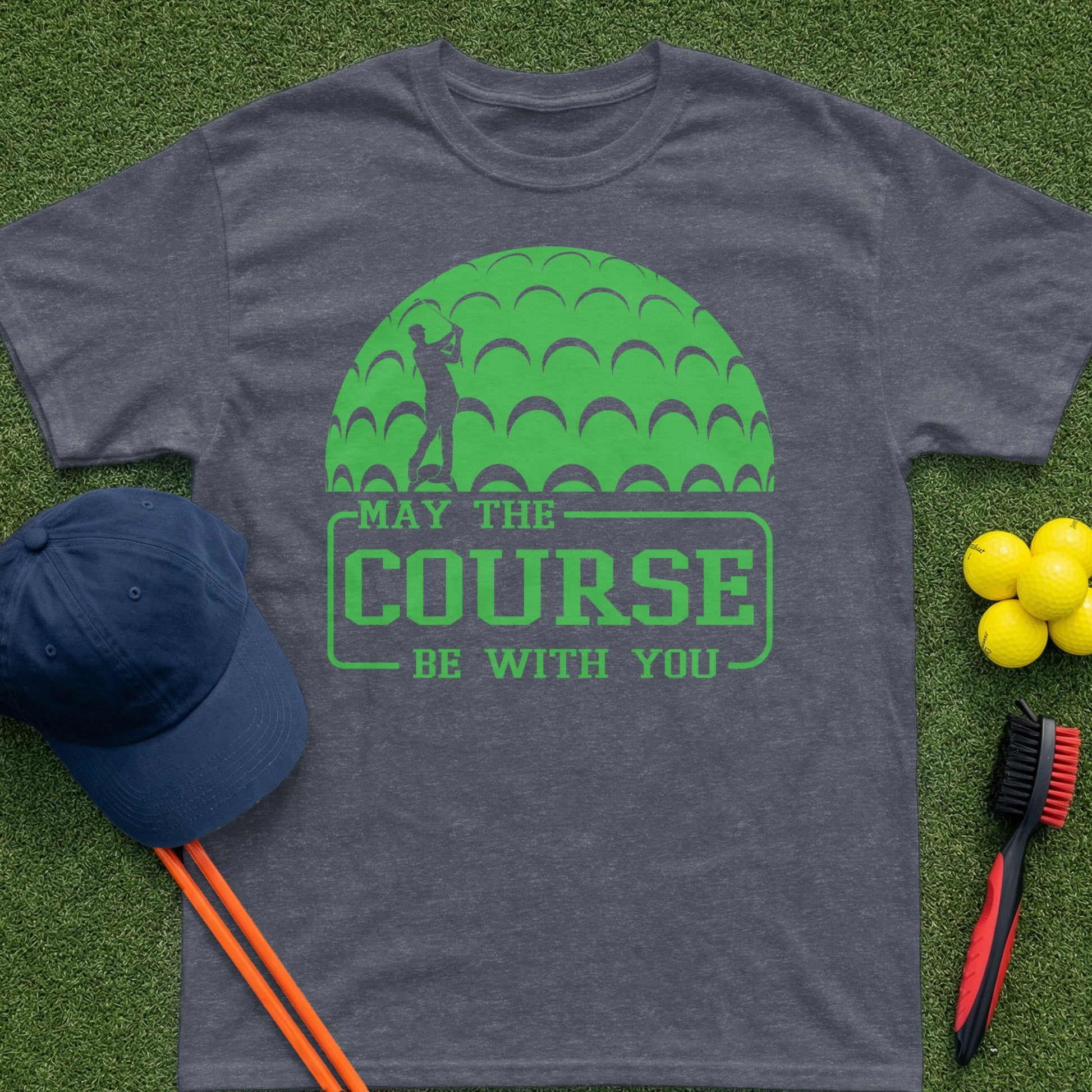 Charcoal t-shirt with green golf ball graphic and "May the Course be with you" text.