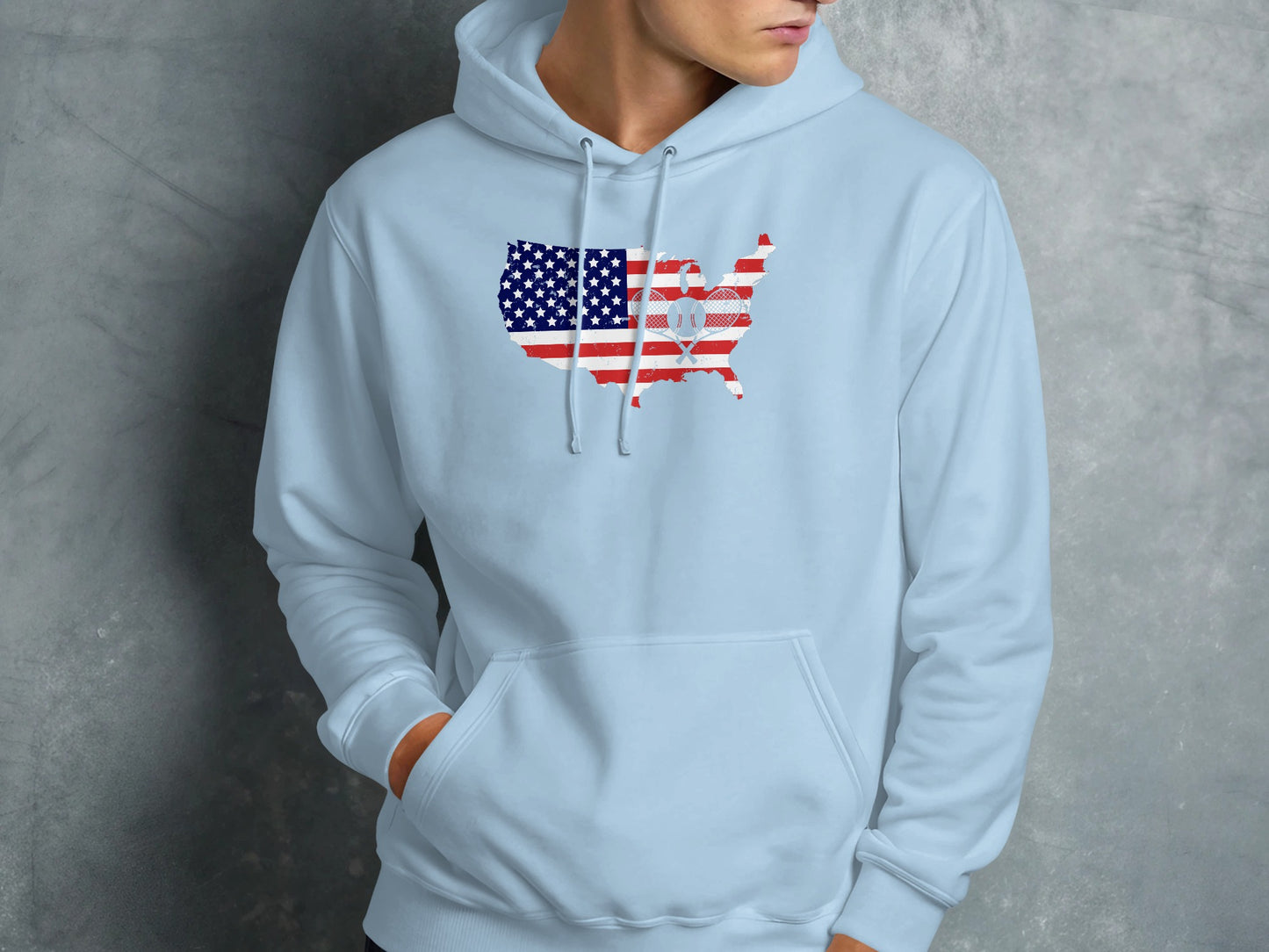 Light blue hoodie with US map featuring the American flag and a tennis ball graphic.