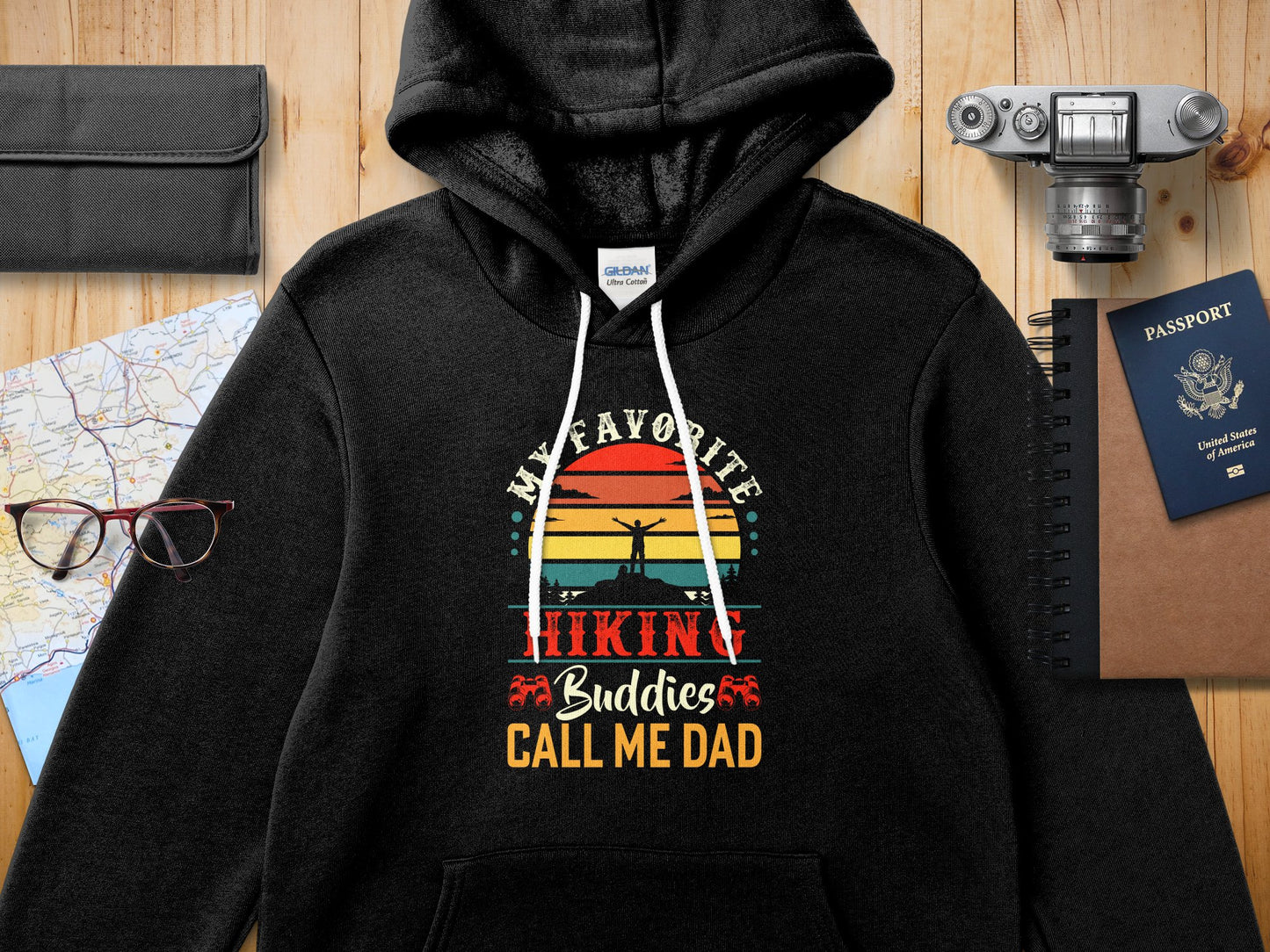 Gildan black hoodie with "My Favorite Hiking Buddies Call Me Dad" graphic.